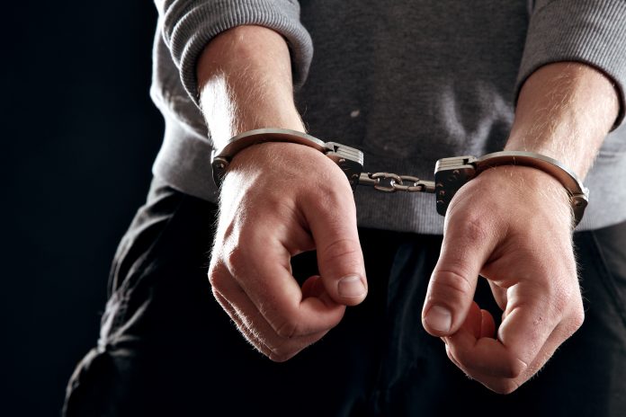 Handcuffed Man